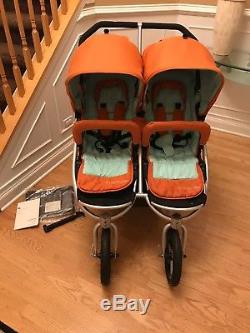 orange double stroller