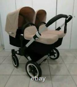 Bugaboo Donkey twin in sand with double maxi Cosi car seat adapter
