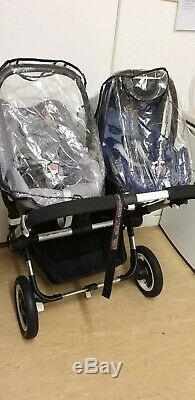Bugaboo donkey twin sets in sand with car seats, footmuffs etc