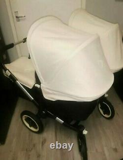 Free postage Bugaboo donkey twin in offwhite with car seats, isofix bases